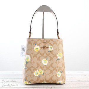 NWT Coach Small Town Bucket Bag with Daisy Print